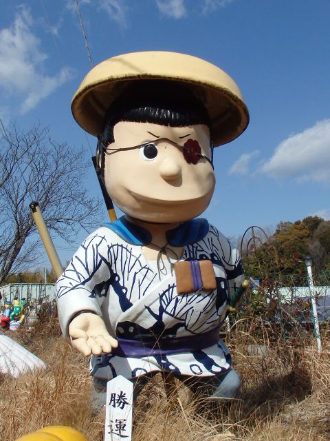 Mori-no-Ishimatsu, with an eye patch as his symbolic item, postuing for formal salutation among gamblers.