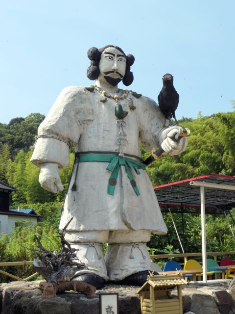Emperor Jinmu statue with a yatagarasu, or mystical tripod crow, handcrafted by residents.